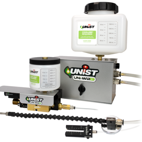 Unist Uni-Max ST minimum quantity lubrication system with reservoirs, pump enclosure, and adjustable spray nozzle